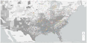 A screenshot of a map showing counties in shades of gray and small colorful dots